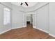 Office with hardwood floors, french doors, and neutral paint at 6407 213Th E St, Bradenton, FL 34211