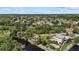 Beautiful aerial view of a waterfront community with lush greenery and charming homes nestled along a tranquil river setting at 6718 68Th E Ave, Bradenton, FL 34203