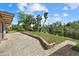 Beautiful waterfront backyard with a brick patio, a lush lawn, and picturesque views of the tranquil river at 6718 68Th E Ave, Bradenton, FL 34203