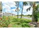 View of the community pond and grounds from the condo backyard at 7173 W Country Club N Dr # 141, Sarasota, FL 34243
