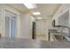 Open-concept kitchen featuring stainless steel appliances and great natural light at 7173 W Country Club N Dr # 141, Sarasota, FL 34243