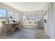 Office/den with a large window, a striped rug, and ample storage space at 7173 W Country Club N Dr # 141, Sarasota, FL 34243