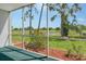 The home's screened lanai overlooks the golf course and pond at 7173 W Country Club N Dr # 141, Sarasota, FL 34243