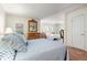 Spacious bedroom with a connecting doorway to another bedroom and beachy decor at 8592 Hidden Lagoon Rd, Sarasota, FL 34242