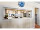 Kitchen view with stainless steel appliances and stone counters at 8592 Hidden Lagoon Rd, Sarasota, FL 34242