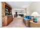 Inviting living area features tile flooring, comfortable seating, and beach views at 8592 Hidden Lagoon Rd, Sarasota, FL 34242