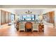 Bright living space with a desk, ocean views, and plenty of natural light at 8592 Hidden Lagoon Rd, Sarasota, FL 34242