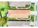 Aerial view showcasing the property's roof, landscaping, and private screened-in lanai at 8721 Trattoria Ter, Sarasota, FL 34238