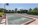 View of a bocce ball court on a sunny day at 8721 Trattoria Ter, Sarasota, FL 34238