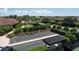 Bocce ball court and landscaping, with homes in the background at 8721 Trattoria Ter, Sarasota, FL 34238