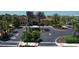 A clubhouse with well-maintained landscaping, ample parking, and inviting entrances at 8721 Trattoria Ter, Sarasota, FL 34238