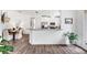 Bright kitchen featuring white cabinets, stainless appliances, and modern design at 8721 Trattoria Ter, Sarasota, FL 34238