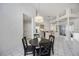 Dining area featuring open layout with decorative chandelier providing ample light at 8824 Havenridge Dr, Sarasota, FL 34238
