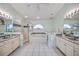 Spa-like main bathroom with dual vanities, a separate shower, and a luxurious soaking tub at 8824 Havenridge Dr, Sarasota, FL 34238