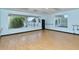 Bright dance studio with hardwood floors and large windows at 9630 Club South Cir # 6209, Sarasota, FL 34238