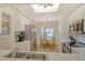 Bright kitchen featuring white cabinetry, stainless steel appliances, and a breakfast nook at 9630 Club South Cir # 6209, Sarasota, FL 34238