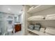 Bathroom with walk-in shower and built-in storage at 99 Sunset Dr # 102, Sarasota, FL 34236