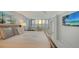 Bedroom with large picture window overlooking the ocean providing an abundance of natural light at 99 Sunset Dr # 102, Sarasota, FL 34236