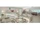 Bright living room features modern decor, comfortable seating, and seamless flow to the kitchen at 99 Sunset Dr # 102, Sarasota, FL 34236