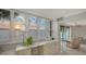 Office featuring custom built-ins, ample natural light, and panoramic ocean view at 99 Sunset Dr # 102, Sarasota, FL 34236
