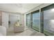 Water view through large window showcasing expansive water feature and calming decor at 99 Sunset Dr # 102, Sarasota, FL 34236