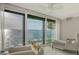 Water view through large window showcasing expansive water feature and calming decor at 99 Sunset Dr # 102, Sarasota, FL 34236