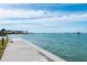 Enjoy stunning waterfront views and access from the property's private walkway at 99 Sunset Dr # 102, Sarasota, FL 34236