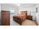 Bedroom featuring a ceiling fan and an expansive view of the water at 1020 Tidewater Shores Loop # 304, Bradenton, FL 34208