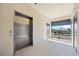 Hallway to unit features elevator access and beautiful views at 1020 Tidewater Shores Loop # 304, Bradenton, FL 34208