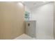 Modern bathroom featuring walk-in shower with golden fixtures at 1050 55Th S Ave, St Petersburg, FL 33705