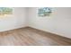 Bedroom with wood floors, neutral paint and natural light at 1050 55Th S Ave, St Petersburg, FL 33705