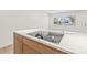 Modern kitchen cooktop on an island with quartz countertops and custom cabinetry, providing style and functionality at 1050 55Th S Ave, St Petersburg, FL 33705