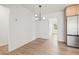 Dining Room featuring modern light fixture and view into the kitchen at 1050 55Th S Ave, St Petersburg, FL 33705