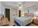 Serene main bedroom with soft lighting, ceiling fan, and window blinds at 1110 49Th Avenue W Dr, Bradenton, FL 34207