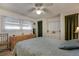 Cozy main bedroom features natural light and ample storage with a large closet at 1110 49Th Avenue W Dr, Bradenton, FL 34207