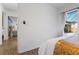 Bedroom featuring outdoor access, neutral colors, and wood flooring at 11219 93Rd St, Largo, FL 33773