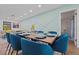 Open concept dining area with seating for eight, adjacent to the living room, perfect for entertaining at 11219 93Rd St, Largo, FL 33773