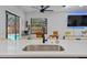 The kitchen boasts white countertops, an undermount sink, and stainless faucet at 11219 93Rd St, Largo, FL 33773
