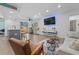 Bright and open living area featuring a modern kitchen and comfortable seating at 11219 93Rd St, Largo, FL 33773