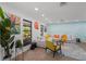 Bright living room featuring modern decor, stylish furniture and a large window with natural light at 11219 93Rd St, Largo, FL 33773