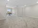 A versatile bonus room with gray carpet, dormered ceilings, and a workstation area at 12029 Cranston Way, Lakewood Ranch, FL 34211