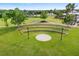 Community amphitheater with lawn seating and paved stage area perfect for outdoor performances and gatherings at 12592 Ryegrass Loop, Parrish, FL 34219