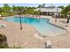 Aerial view of the community pool, zero entry pool, and lounge area with plenty of seating at 12592 Ryegrass Loop, Parrish, FL 34219
