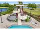 A view of the water slide that empties into the community pool at 12592 Ryegrass Loop, Parrish, FL 34219