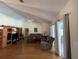 Comfortable living room with a ceiling fan, cozy furniture, and access to natural light at 12809 7Th Ne Ave, Bradenton, FL 34212