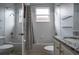 Bright bathroom featuring a shower-tub combination and granite vanity at 1322 Millbrook Cir, Bradenton, FL 34212