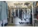 Walk-in closet with organized shelving, hanging clothes, shoes, and overhead storage for optimal organization at 1322 Millbrook Cir, Bradenton, FL 34212