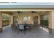 Relaxing community pool with covered seating, ceiling fans, and bathroom facilities at 1322 Millbrook Cir, Bradenton, FL 34212