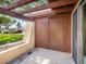 Covered entryway with storage and closet space at 1421 57Th W St # 1421, Bradenton, FL 34209