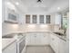 Updated kitchen featuring stainless steel appliances, modern cabinets, and elegant countertops at 1421 57Th W St # 1421, Bradenton, FL 34209